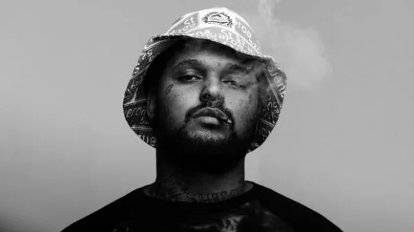 Illustration pour ScHoolboy Q converse avec Kanye West sur « THat Part »